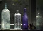 Still Life With Bottles And Found Figurines