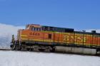 Orange Train in Snow