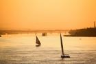 Pair of Falukas and Sightseers on Nile River, Luxor, Egypt