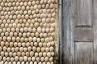 Cowrie shells on wall of building, Ibo Island, Morocco