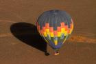 Hot air balloon over Namib Desert, near Sesriem, Namibia, Africa.