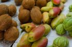 Mangos and coconuts at the market on Mahe Island