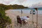 Private dinner on the beach at Banyan Tree Resort, Mahe Island, Seychelles