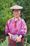 Portrait of a farmer wearing bamboo hat, Bumthang, Bhutan