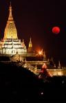 Asia, Myanmar, Bagan, moon rising over Ananda temple
