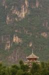 Pagoda and giant karst peak behind, Yangshuo Bridge, China