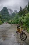 Bicycle sits in front of the Guilin Mountains, Guilin, Yangshuo, China