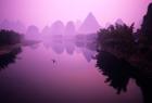 Fisherman on Raft in Li River, Yangshou, Guanxi, China