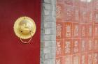 Temple wall and brass door accent. Great Wall of China, Tianjin, China