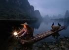 Chinese Woman Fishing with Cormorants, near Guilin, Li River, China