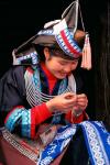 Tip-Top Miao Girl Doing Traditional Embroidery, China