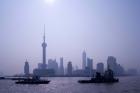 Water Traffic along Huangpu River Passing Oriental TV Tower and Pudong Skyline, Shanghai, China
