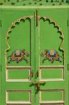 Elephants painted on green door, City Palace, Udaipur, India