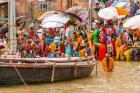 Worshipping pilgrims on Ganges river, Varanasi, India