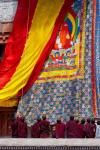 Monks raising a thangka during the Hemis Festival, Ledakh, India