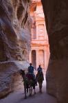 Tourists in Al-Siq leading to Facade of Treasury (Al Khazneh), Petra, Jordan