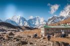 Trekkers and yaks in Lobuche on a trail to Mt Everest