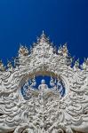 The new all white temple of Wat Rong Khun in Tambon Pa O Don Chai designed by Chalermchai Kositpipat.