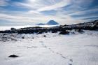 Footsteps in Snow and Mt Ngauruhoe, Tongariro National Park, North Island, New Zealand