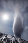 Sun and lenticular cloud over Ohau Range, Canterbury, South Island, New Zealand