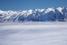 The Roundhill Ski Area with fog covered Lake Tekapo and the Hall Range, South Island, New Zealand