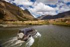 4WD crossing Mararoa River, Mavora Lakes, Southland, South Island, New Zealand