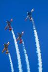 Aerobatic display by North American Harvards, or T-6 Texans, or SNJ, Airshow