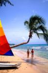 Couple on Beach with Sailboat and Palm Tree, Barbados