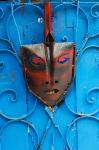 Mask on Callejon de Hamels building walls, Cuba