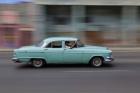 1950's era car in motion, Havana, Cuba