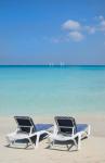 Sand and beach chairs await tourists, Varadero, Cuba