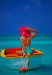 Woman in Boat with Pink Straw Hat, Caribbean