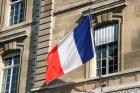 French Flag Facade of Justice Palace Paris, France