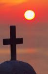 Christian cross, sunset, Mykonos, Greece