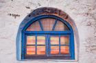 Window with sunset reflection, Mykonos, Greece