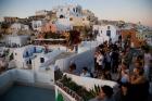 Sunset and The Tourists, Oia, Santorini, Greece