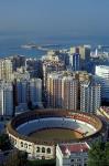 View of Plaza de Toros and Cruise Ship in Harbor, Malaga, Spain