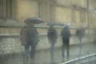 Walking in the rain, Oxford University, England