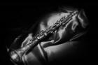 Black And White Still-Life Image Of A Brass Clarinet