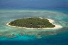 Tavarua Island and coral reef, Mamanuca Islands, Fiji