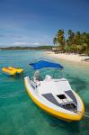 Powerboat and banana boat, Plantation Island Resort, Malolo Lailai Island, Mamanuca Islands, Fiji