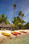 Kayak on the beach, and waterfront bure, Mamanuca Islands, Fiji