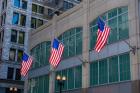 Flags Hanging Outside An Office Building, Chicago, Illinois