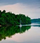 Sailboat Sailing Down the Tombigbee River in Mississippi