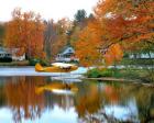 Float plane reflects on Highland Lake, New England, New Hampshire