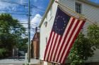 New Hampshire, Portsmouth, Strawberry Banke Historic Area, building with US flag