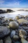 Sunrise On Coast Beach And Rocks