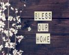 Bless Our Home Flowers on Wood Background