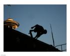 Skateboarder About to Go Down a Halfpipe