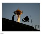 Skateboarder Aloft and Space Needle